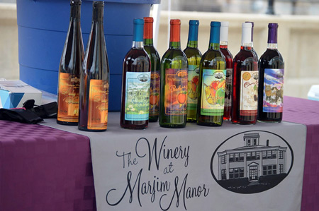 Marjim Manor wines on display on farm market table