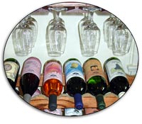 Wine glasses and wine bottles from The Winery at Marjim Manor