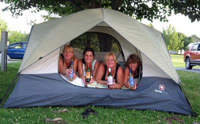 4 people in a tent